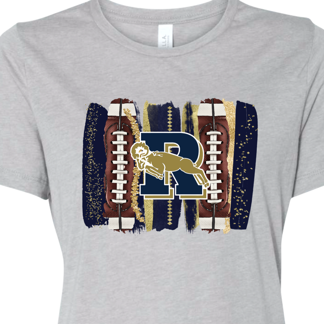 Light Grey Ladies Relaxed Fit Tee with printed glitter and pattern brushstokes with a football image and the Ringgold R Ram Logo. 