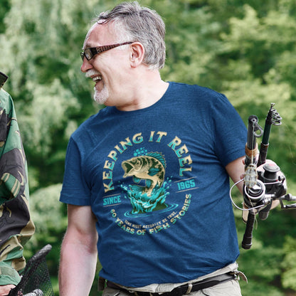 Man wearing a navy blue &quot;Keeping It Reel Since 1965&quot; fishing shirt, funny 60th birthday gift for men