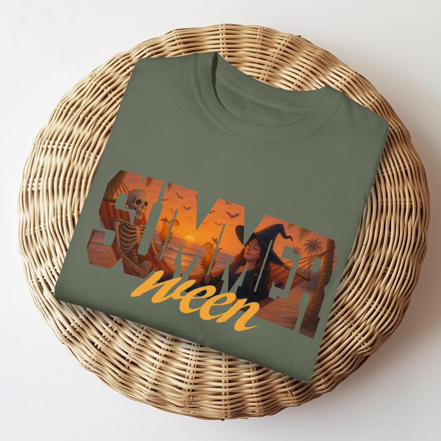 Moss green Comfort Colors folded tee with spooky beach Halloween design