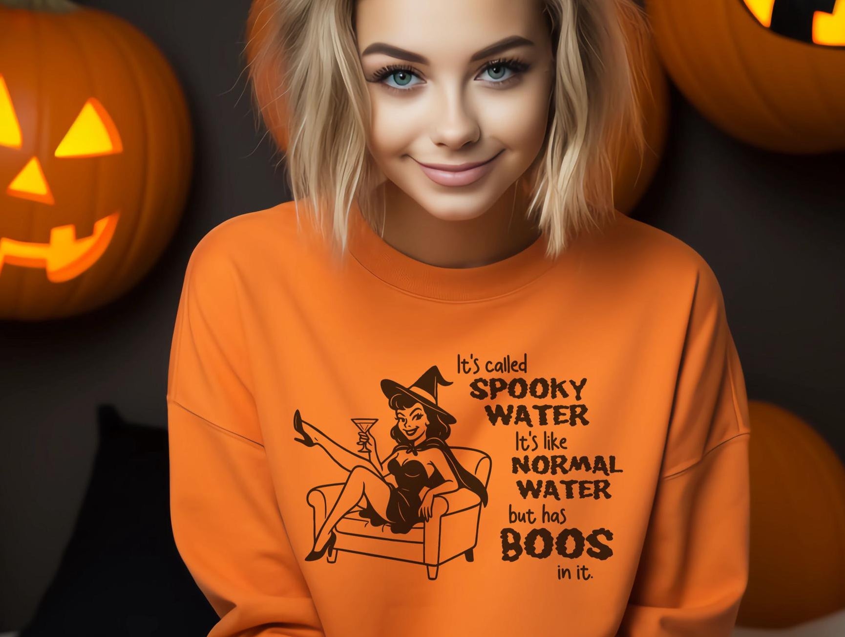 Orange Halloween sweatshirt featuring witch with cocktail and “spooky water” phrase, perfect fall cozy wear.