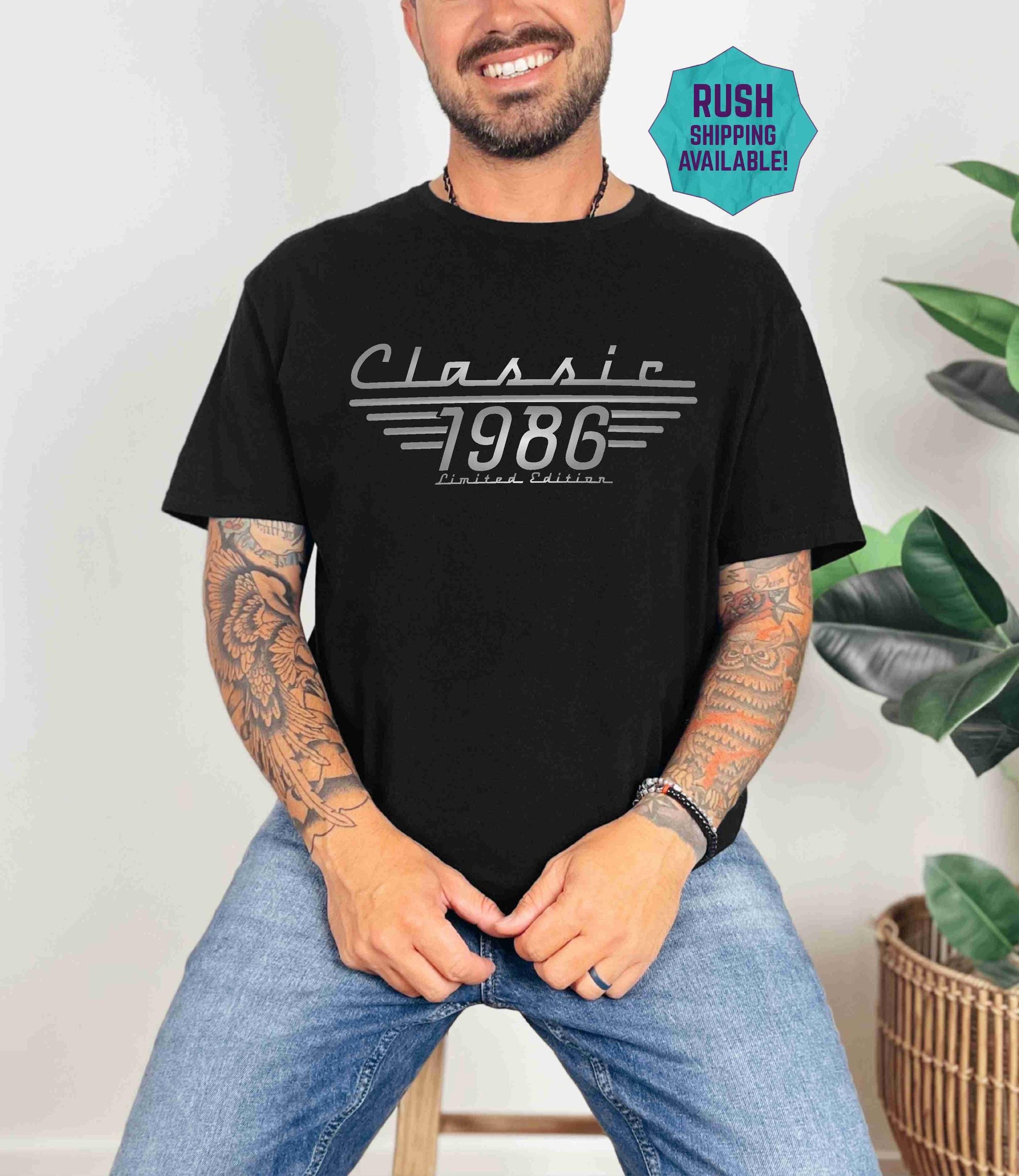 Man wearing an indigo blue Classic 1986 Limited Edition tee, a vintage-style 40th birthday shirt.