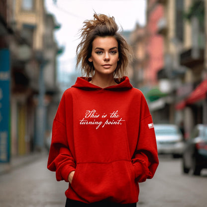 This is our turning point printed on a red pull over hooded sweatshirt with a distressed American Flag printed on the sleeve.