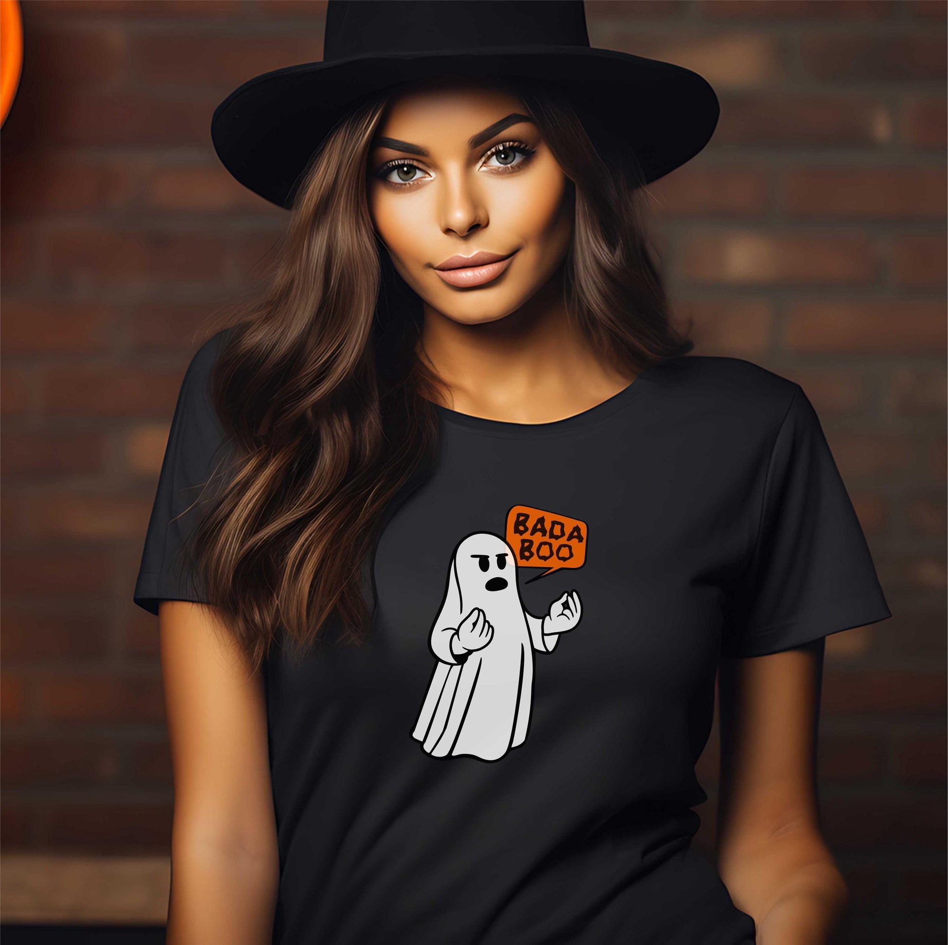 Woman wearing black Bada Boo ghost Halloween shirt styled with a black hat.
