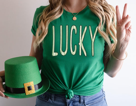 Green lucky St Patrick’s Day t shirt with tall shamrock stripe letters