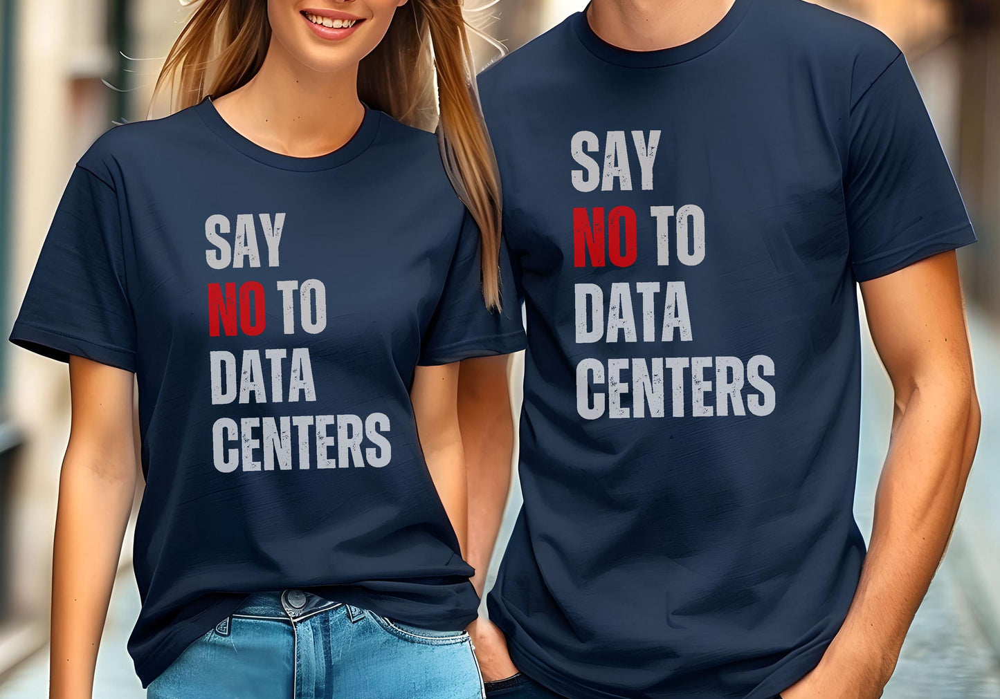 Navy blue t-shirt with bold white and red text reading SAY NO TO DATA CENTERS worn by two people.